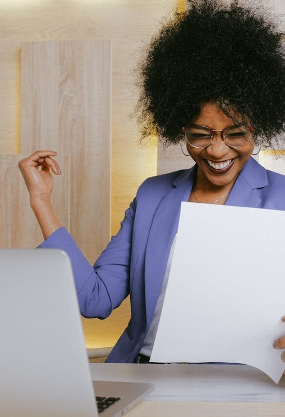 Woman Holding A Paper